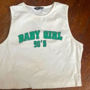 From Shein size Small and says BABY GIRL 90's